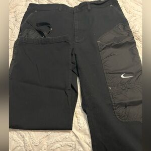NIKE OFF WHITE PANTS SIZE XL.
